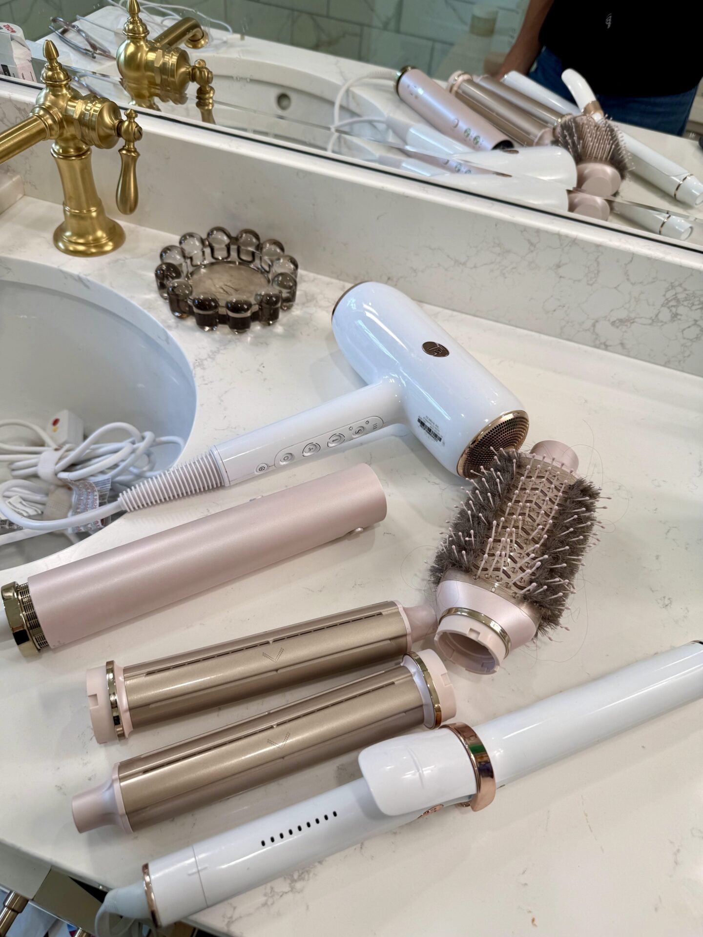 T3 hair tools on bathroom counter