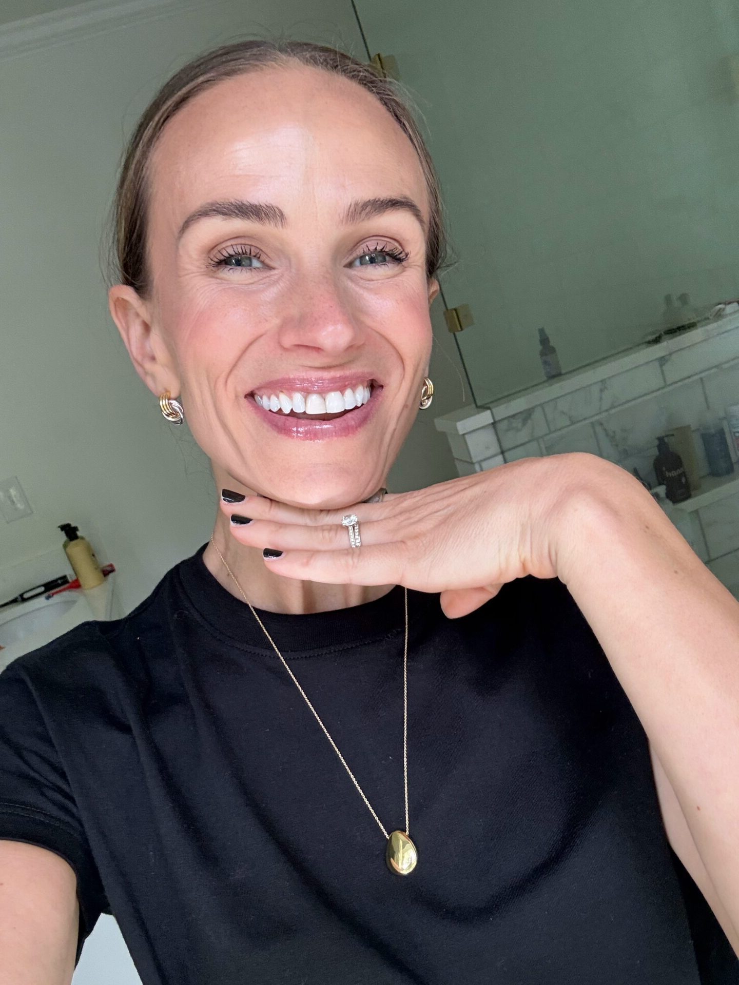 TeriLyn Adams smiling with white teeth from using prime day deals whitening products