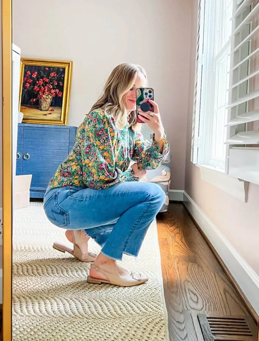 Woman taking selfie in MOTHER Insider Crop Step Jeans
