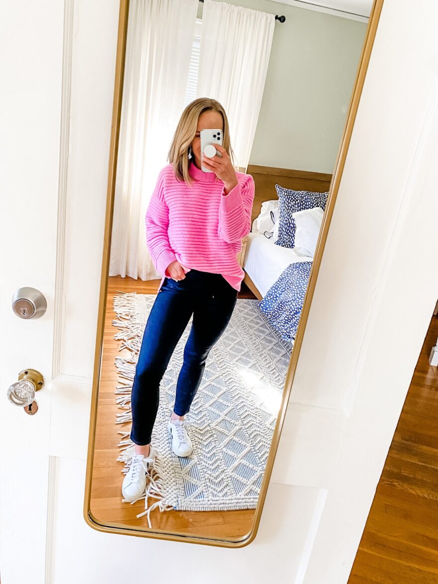TeriLyn Adams wearing skinny jeans and pink sweater