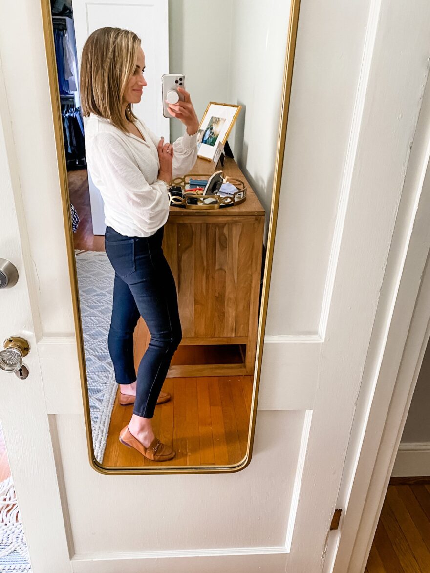 TeriLyn Adams taking a selfie and wearing skinny jeans 