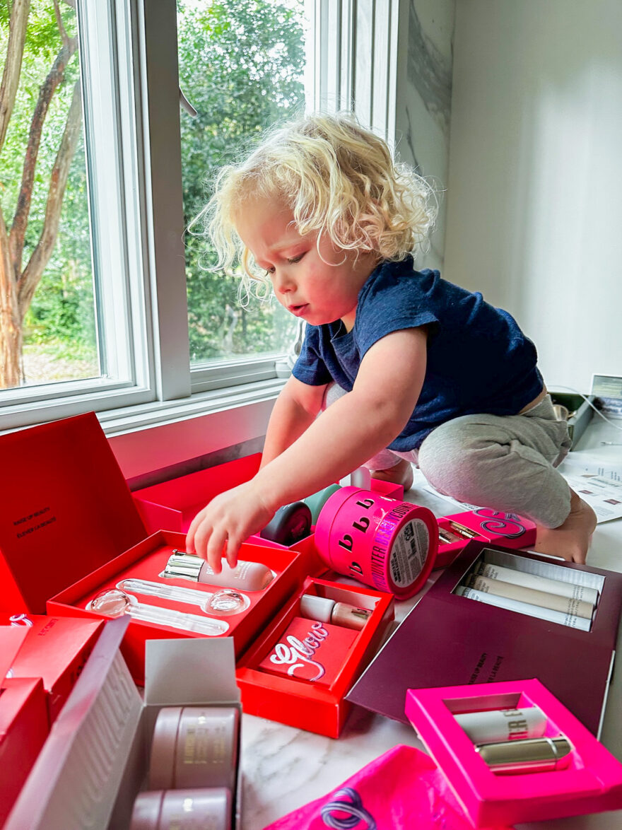 kid playing with Beautycounter Holiday Sets