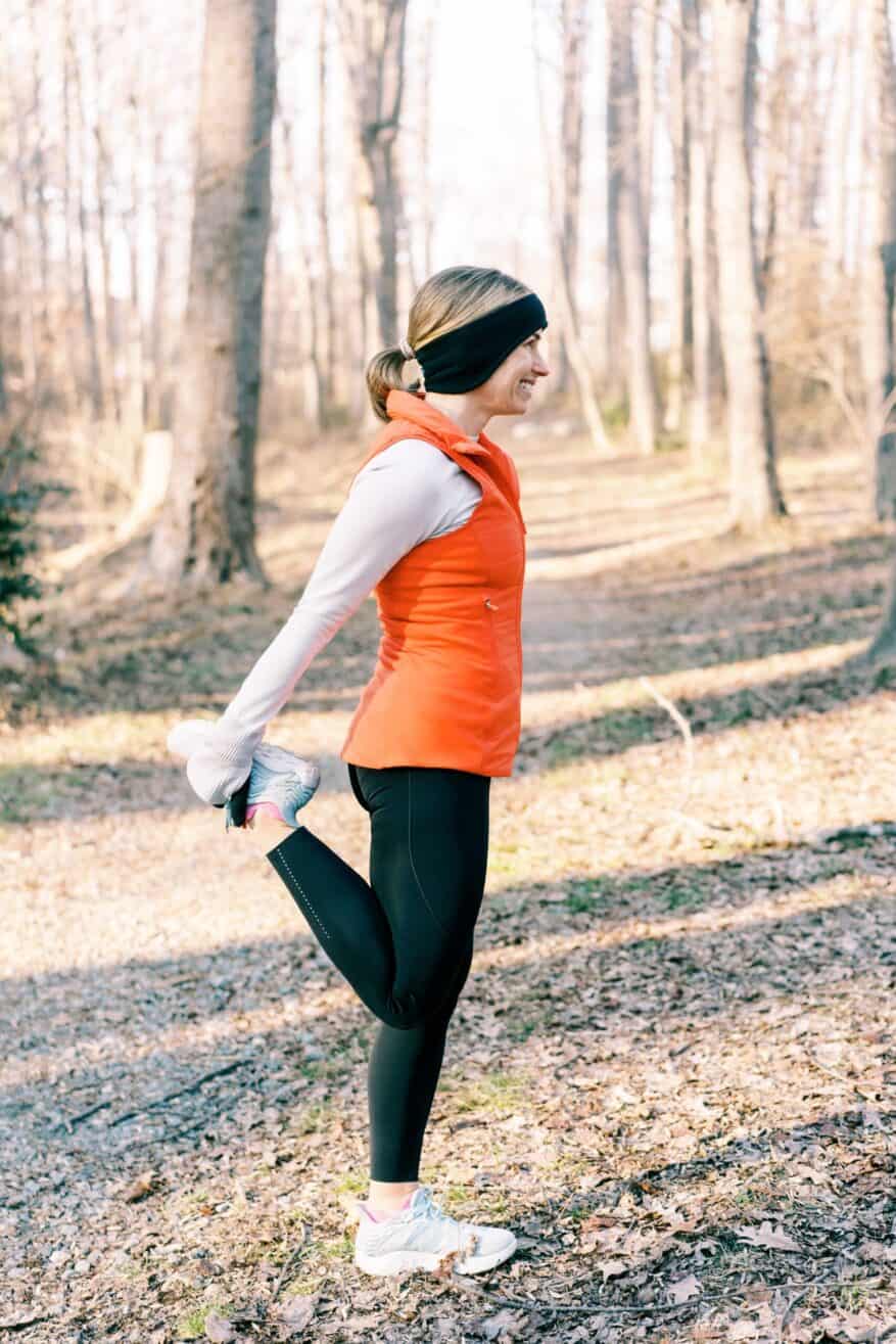 TeriLyn Adams stretching in Another Mile vest by Lululemon