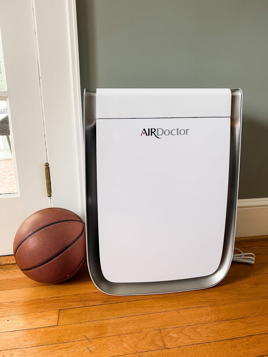 AirDoctor Purifier size next to basketball for comparison