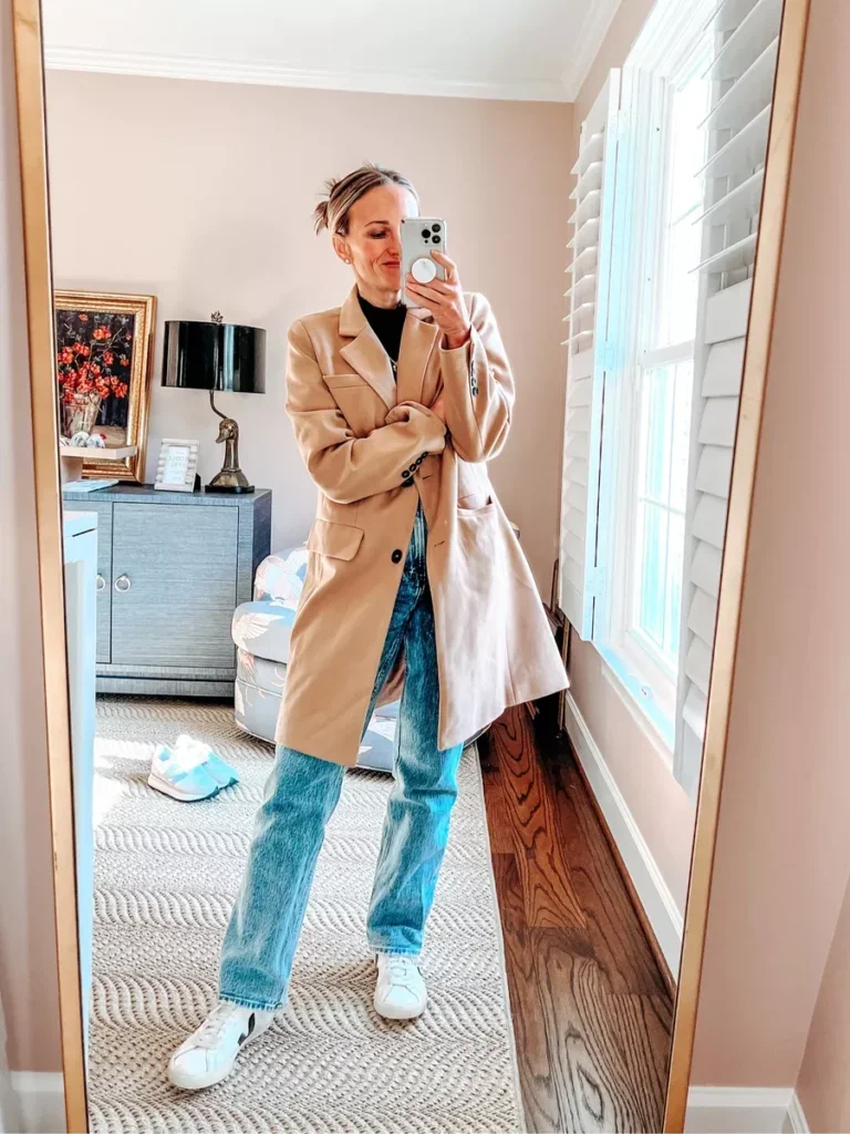TeriLyn Adams wearing coat and Vejas sneakers - one of the Shoes to Wear with Mom Jeans