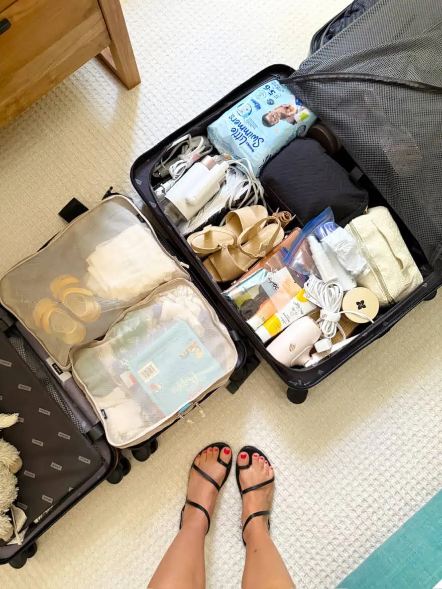 Two suitcases opened on the floor