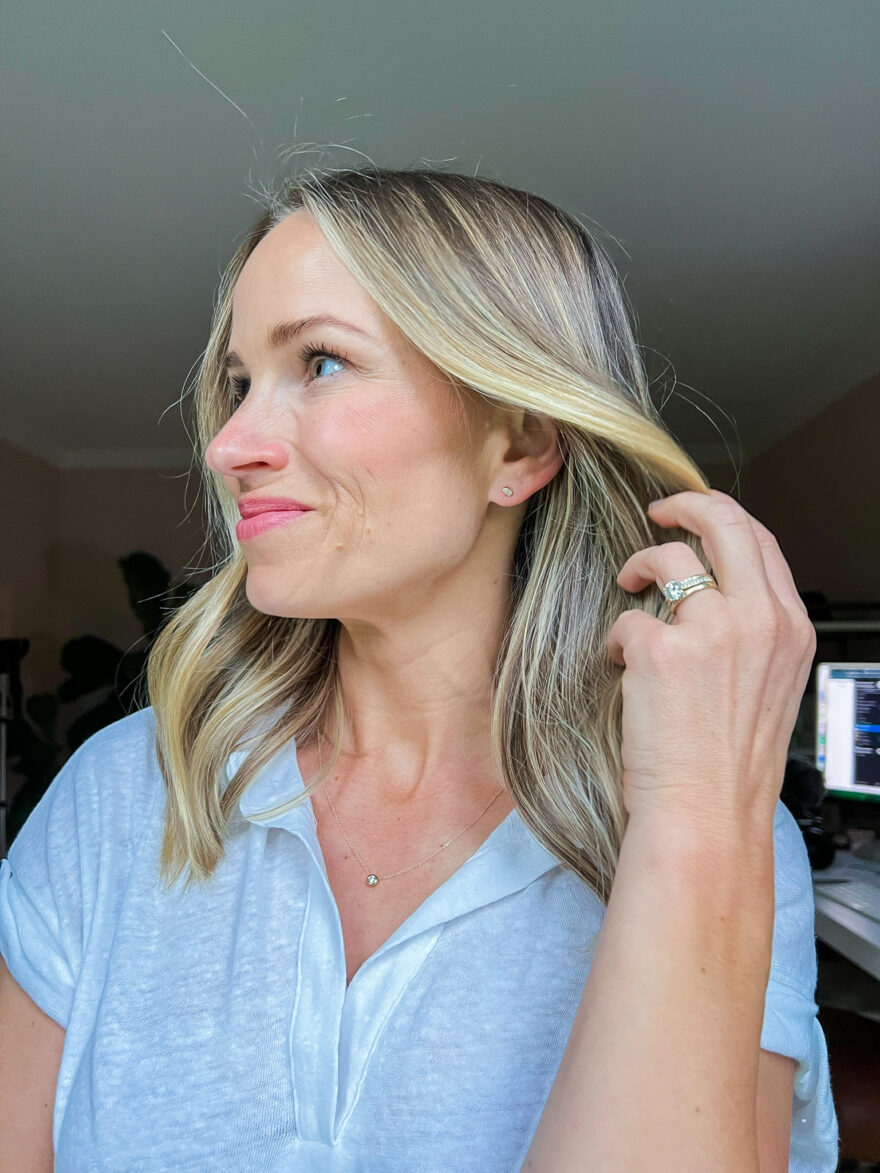 TeriLyn Adams showing her Pavé Diamond Pear Studs for Mejuri Jewelry Review