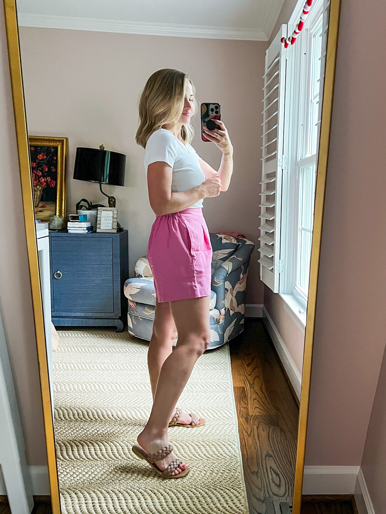 woman wearing white shirt and pink Clean Pull-On Shorts in Linen-Cotton
