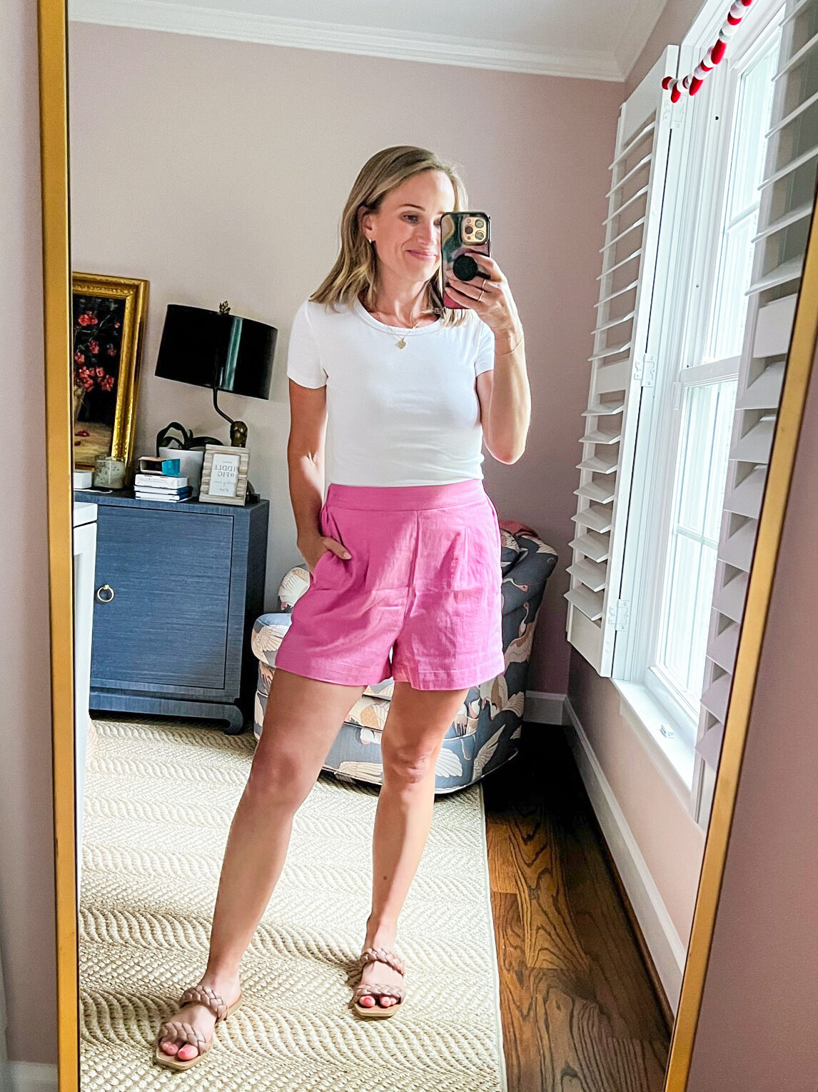 TeriLyn Adams wearing white shirt and Madewell Clean Pull-On Shorts in Linen-Cotton