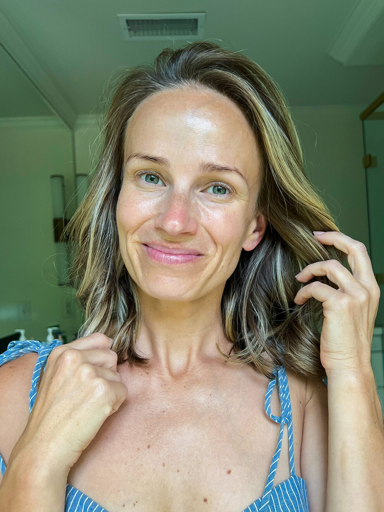 TeriLyn Adams showing her face after using the Beautycounter Overnight Resurfacing Peel