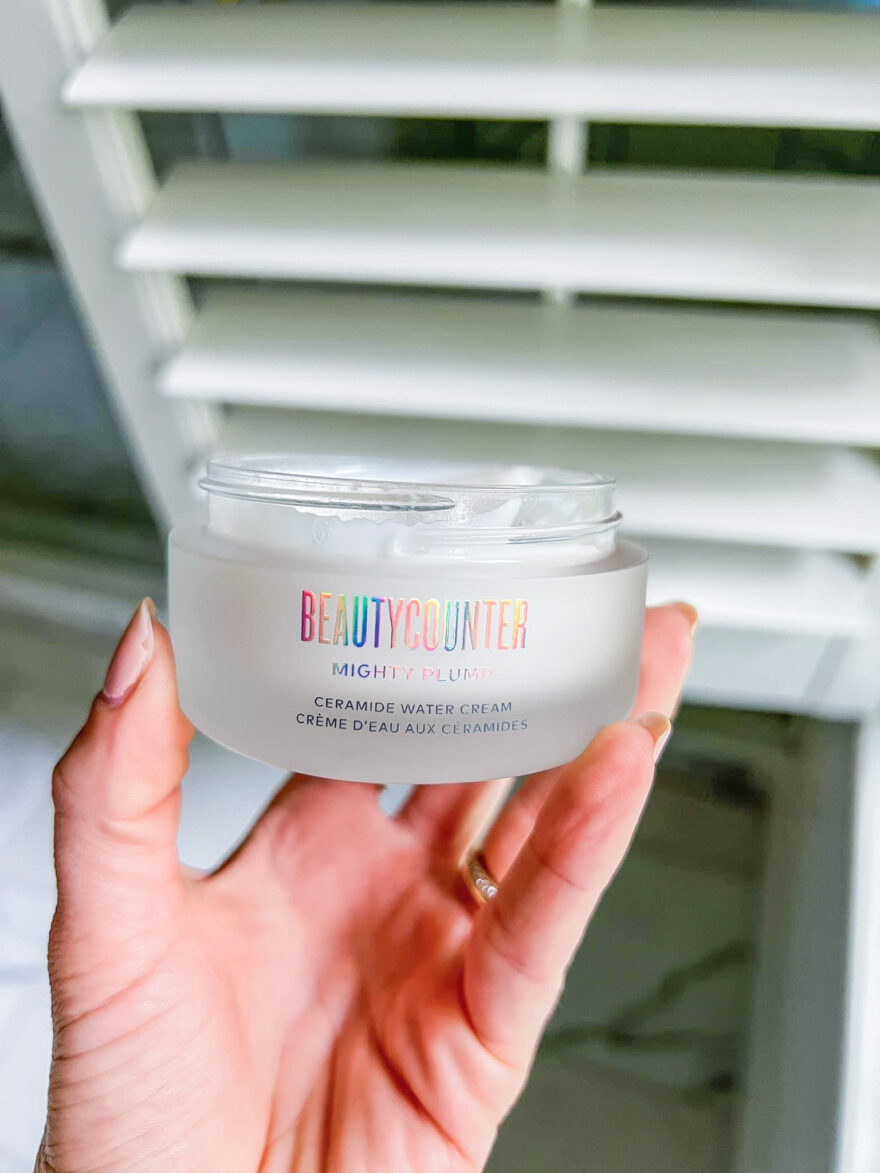 person holding Beautycounter Mighty Plump Ceramide Water Cream Review