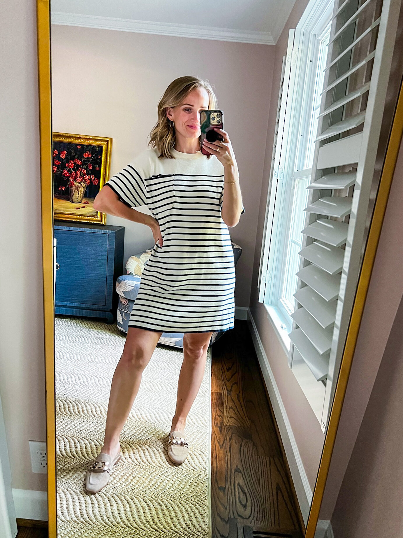 TeriLyn Adams taking a selfie while wearing Striped T-Shirt Dress
