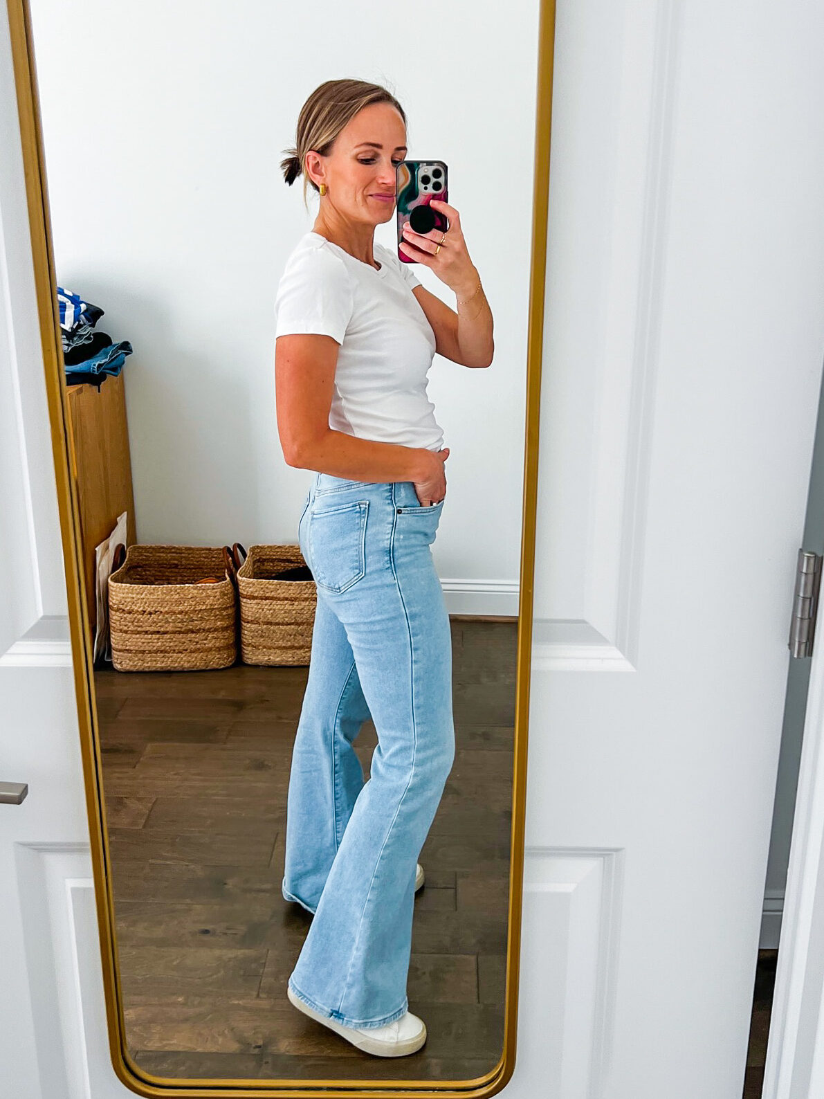 TeriLyn Adams showing the side details of one of the Best Abercrombie Jeans in Ultra High Rise Flare Jean