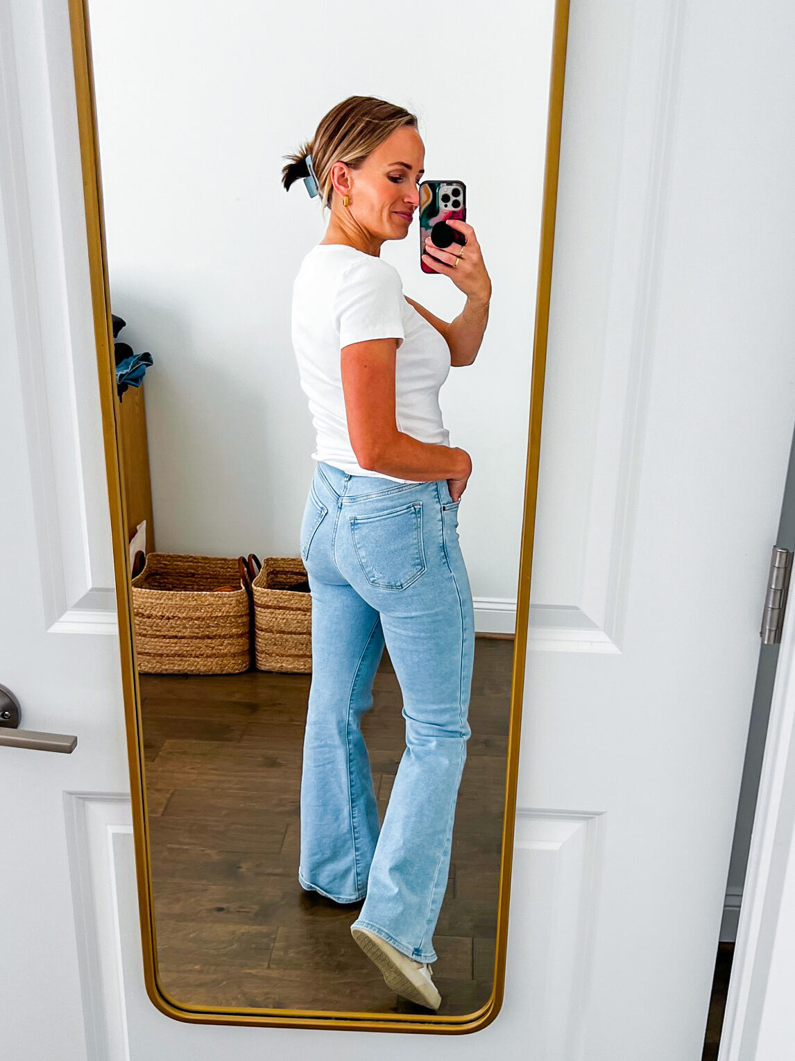 TeriLyn Adams showing the back details of one of the Best Abercrombie Jeans in Ultra High Rise Flare Jean
