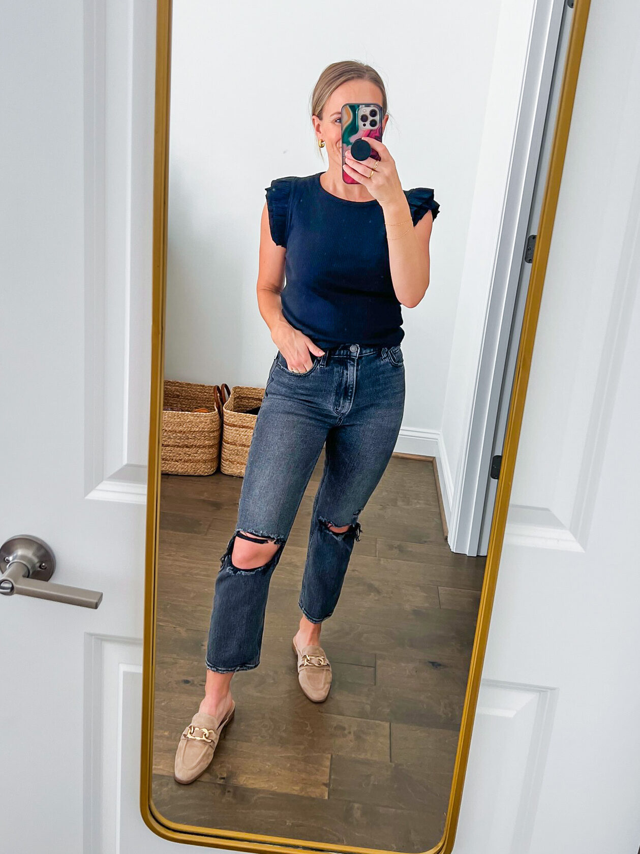 TeriLyn Adams wearing the Abercrombie and Fitch Ultra High-Rise Ankle Straight Jean in black distressed