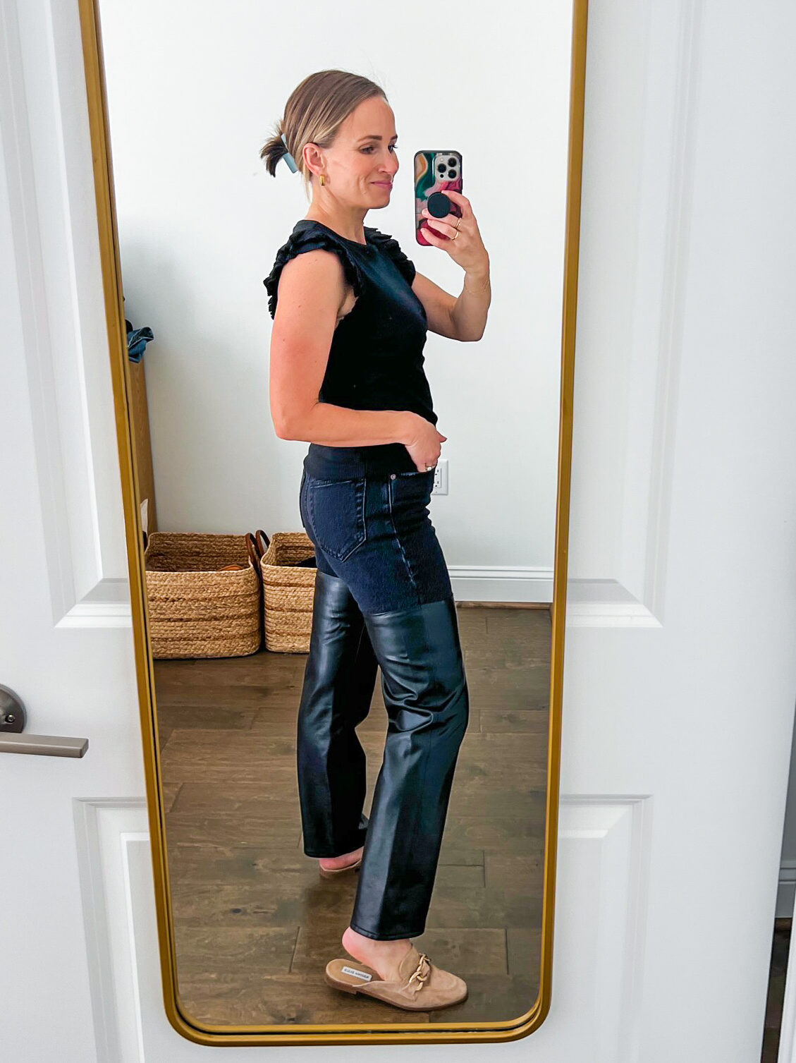 TeriLyn Adams wearing the Ultra High Rise 90s Straight Jeans in leather and denim one of the Best Abercrombie Jeans 