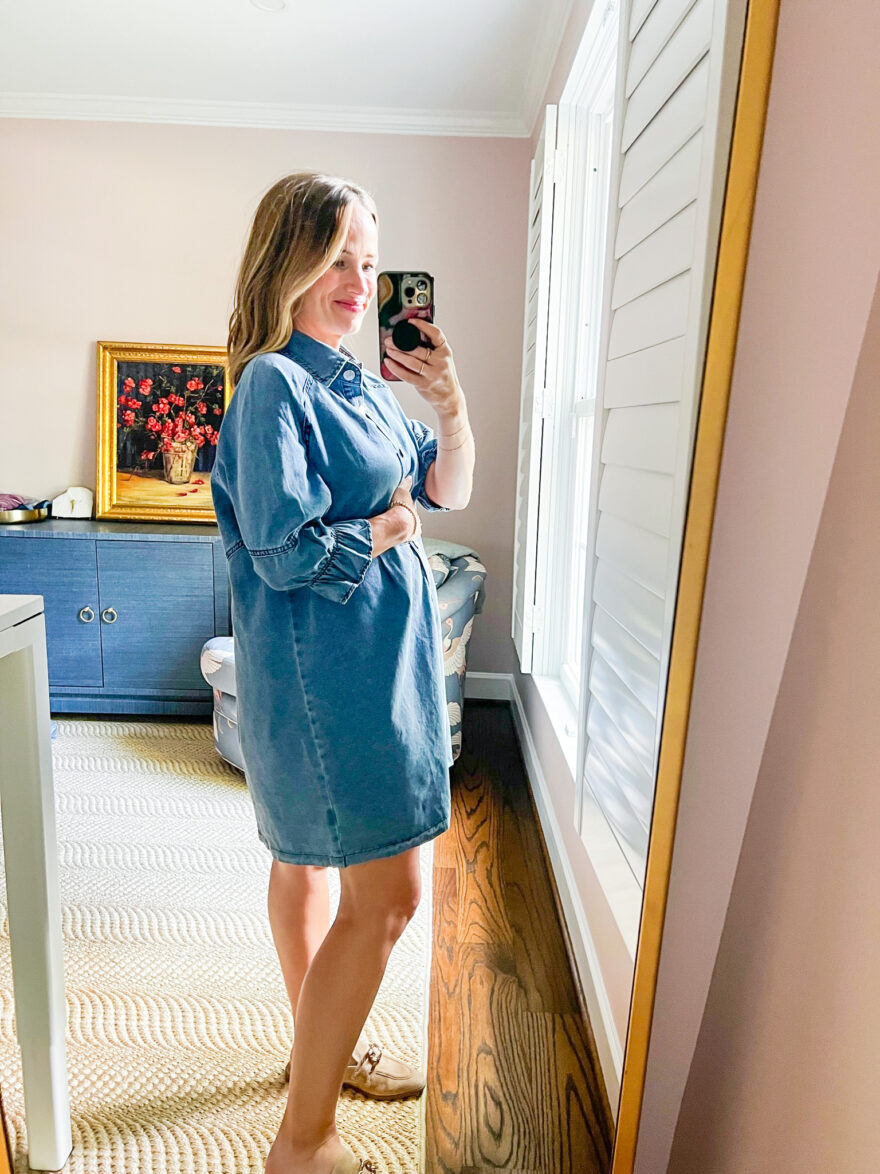 woman showing the side details of her Chambray Denim Shirt Dress