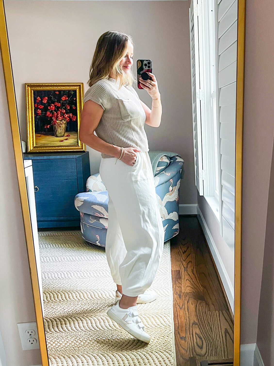 TeriLyn Adams showing the details of her knit top and white pants lounge set from Amazon Best-Sellers