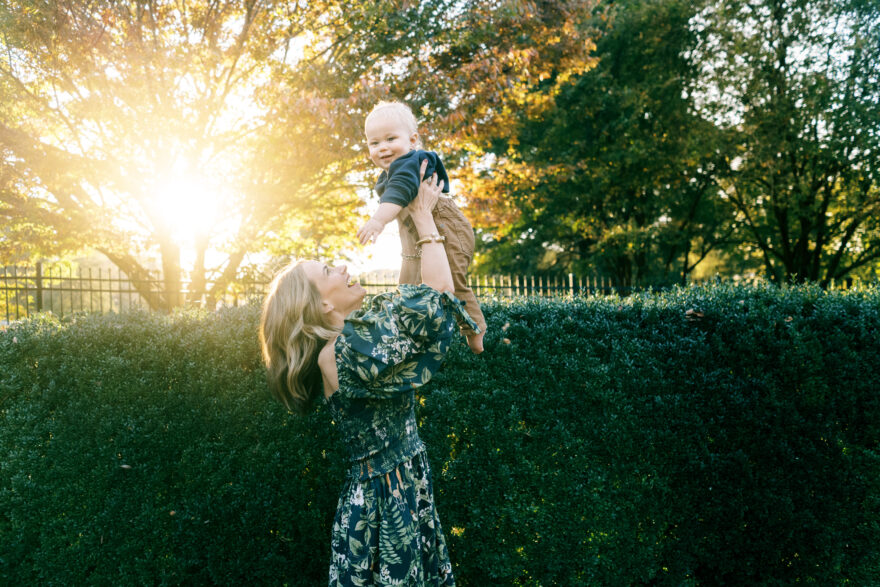 TeriLyn Adams wearing green printed dress and sharing Dresses for Fall Family Photos