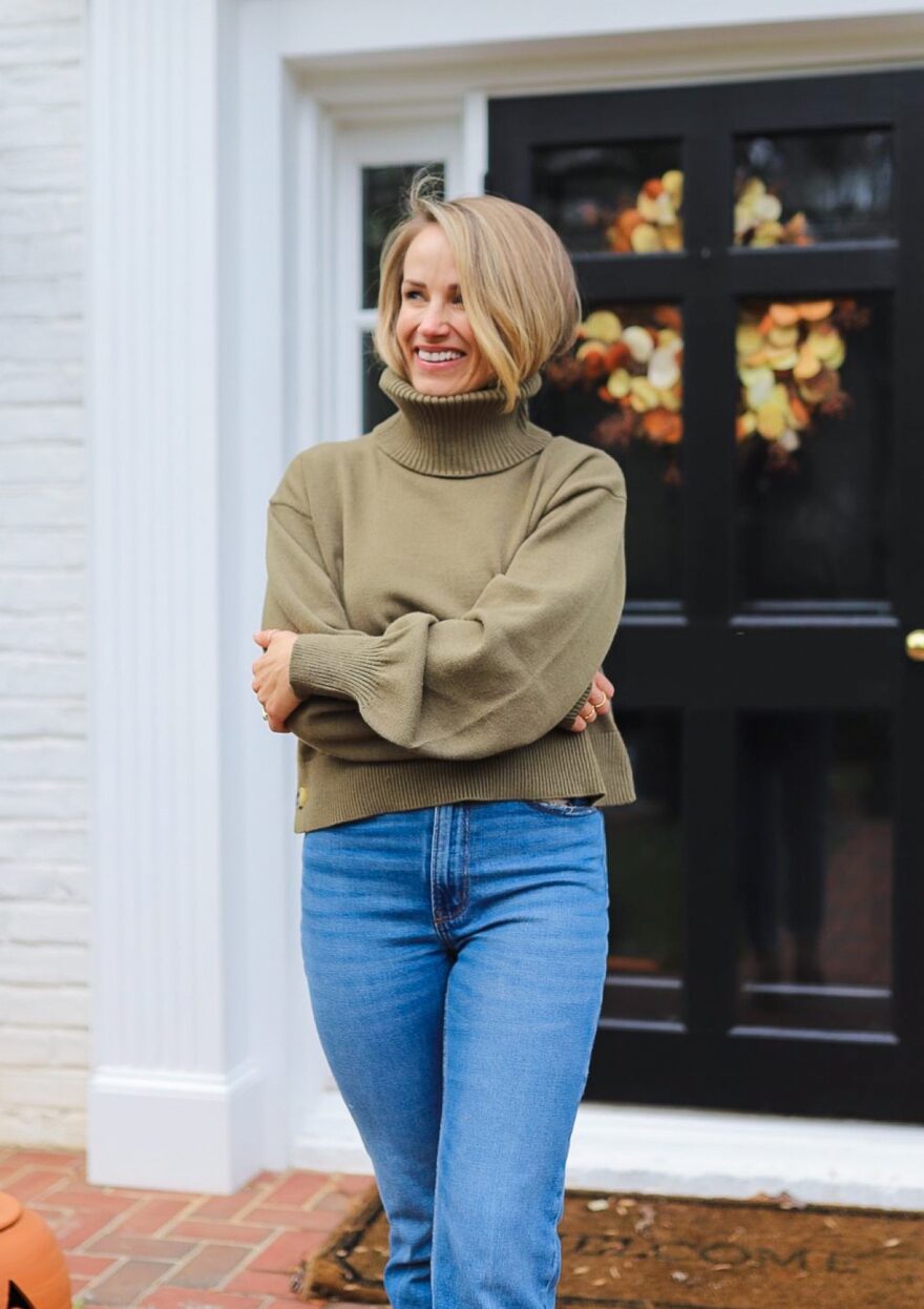 woman wearing Side Button Cropped Turtleneck Sweater