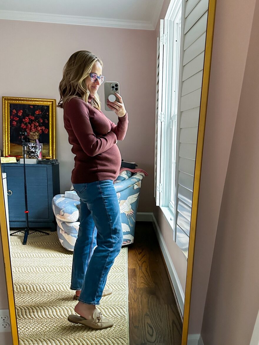 TeriLyn Adams wearing maroon sweater and Petite Maternity Jeans