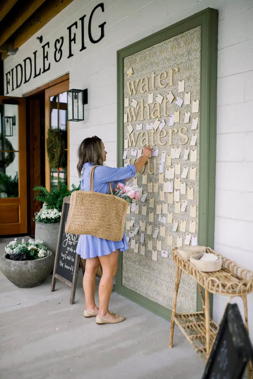 Woman posting a note in one of the best Tuckernuck dresses: Chambray Callahan Shirt Dress