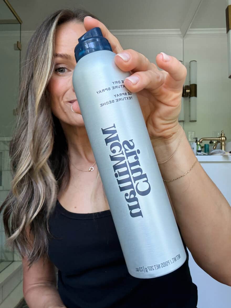 terilyn adams using dry texture spray to hold her curls