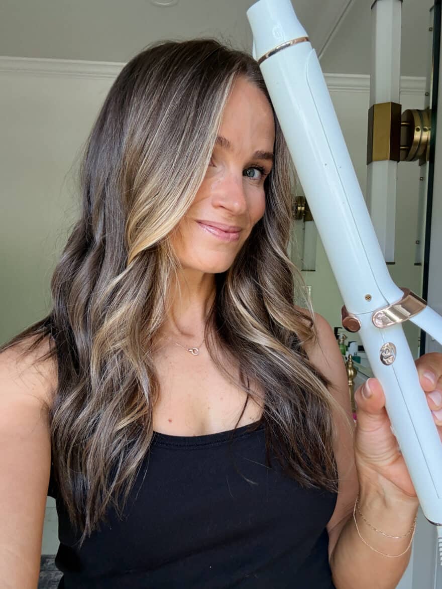 terilyn adams using curling iron barrel to curl her hair