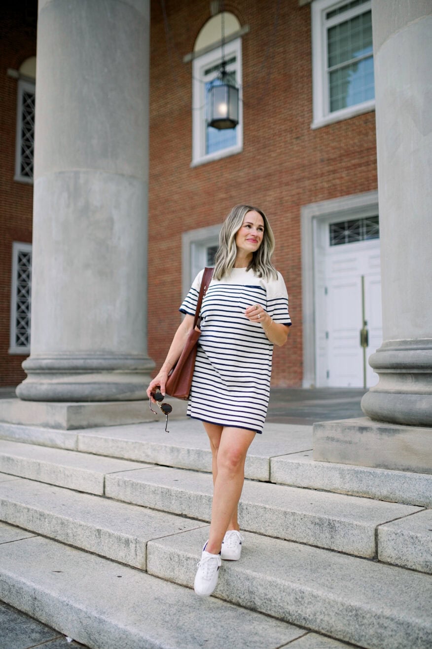 Woman wearing Navy Knit Striped Frenchie Dress by Tuckernuck