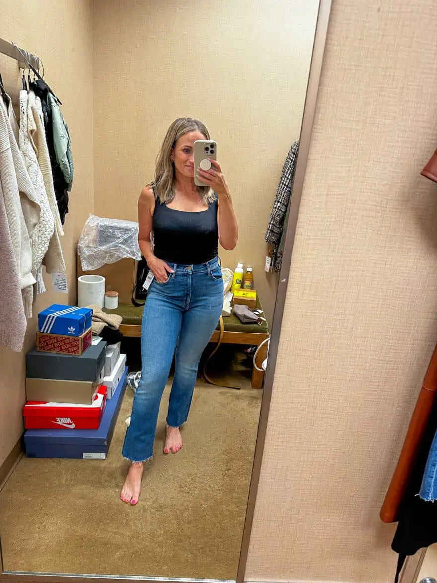 Woman wearing MOTHER The Hustler Frayed Ankle Jeans
