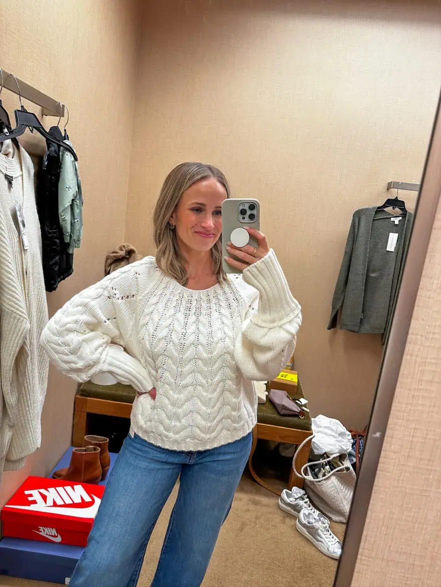 Woman wearing Free People Sandre Cable Stitch Pullover Sweater