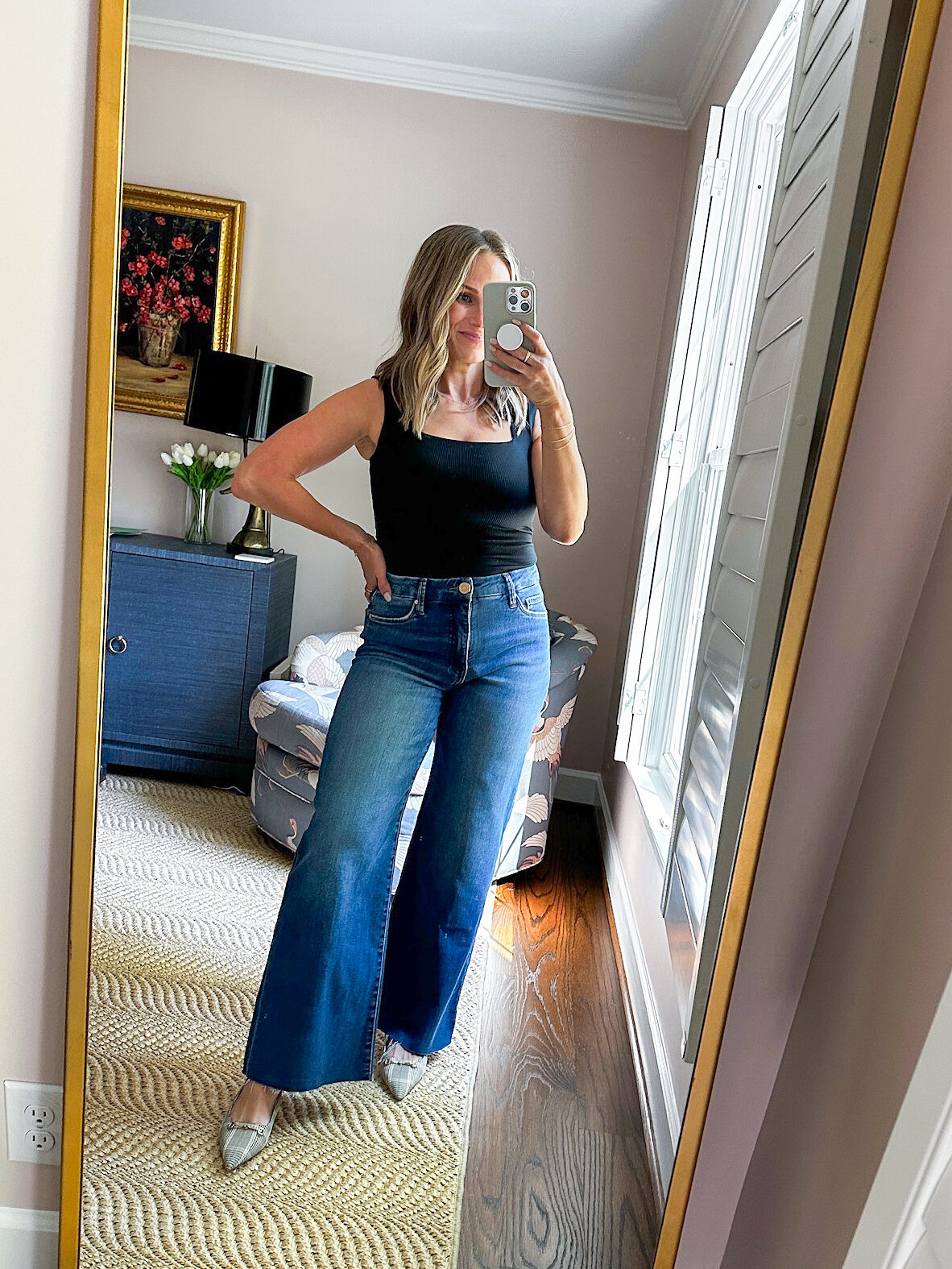 Woman wearing KUT from the Kloth Meg High Waist Raw Hem Ankle Wide Leg Jeans with flats