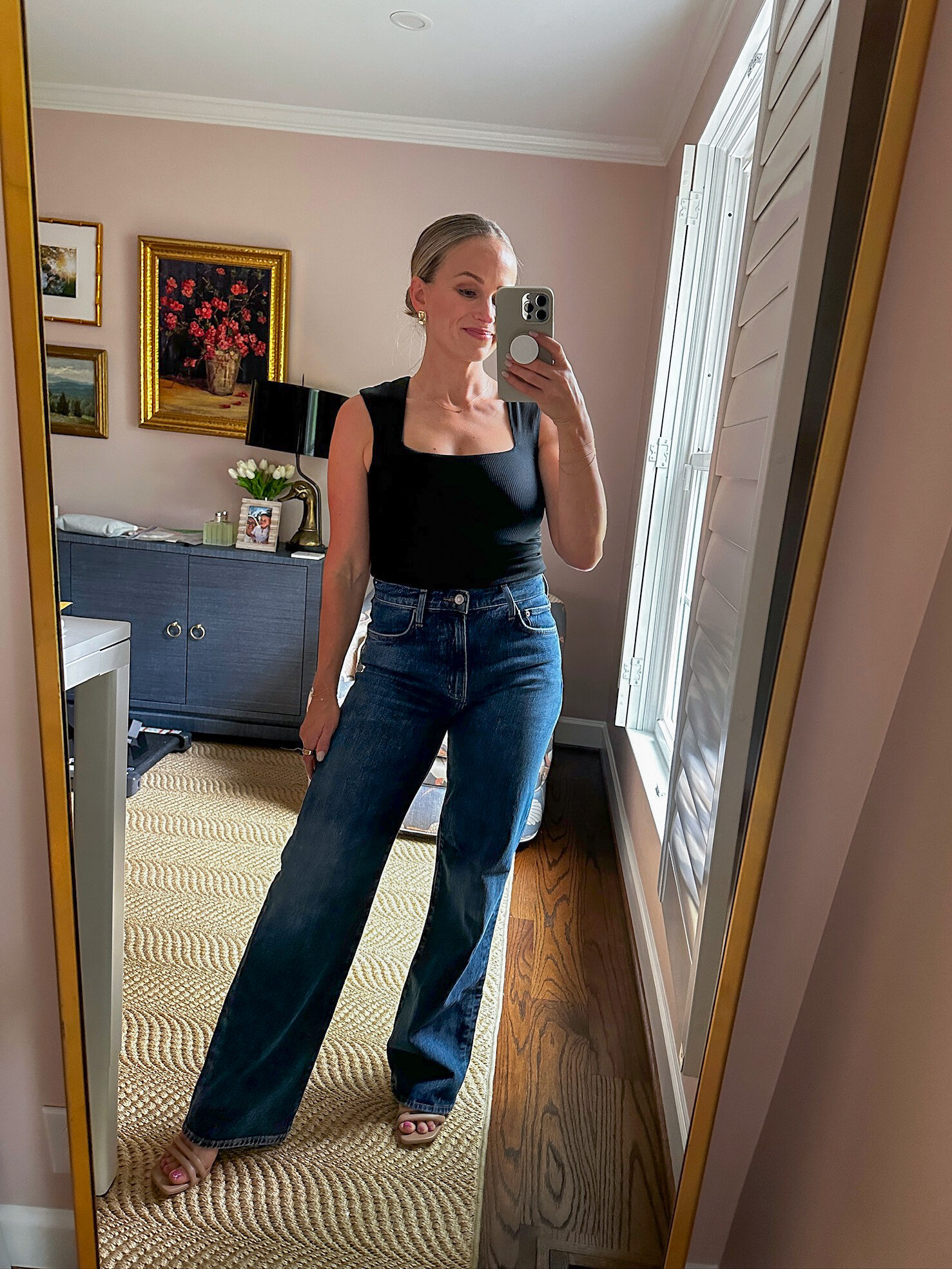 Woman wearing Agolde Harper Jeans with heels