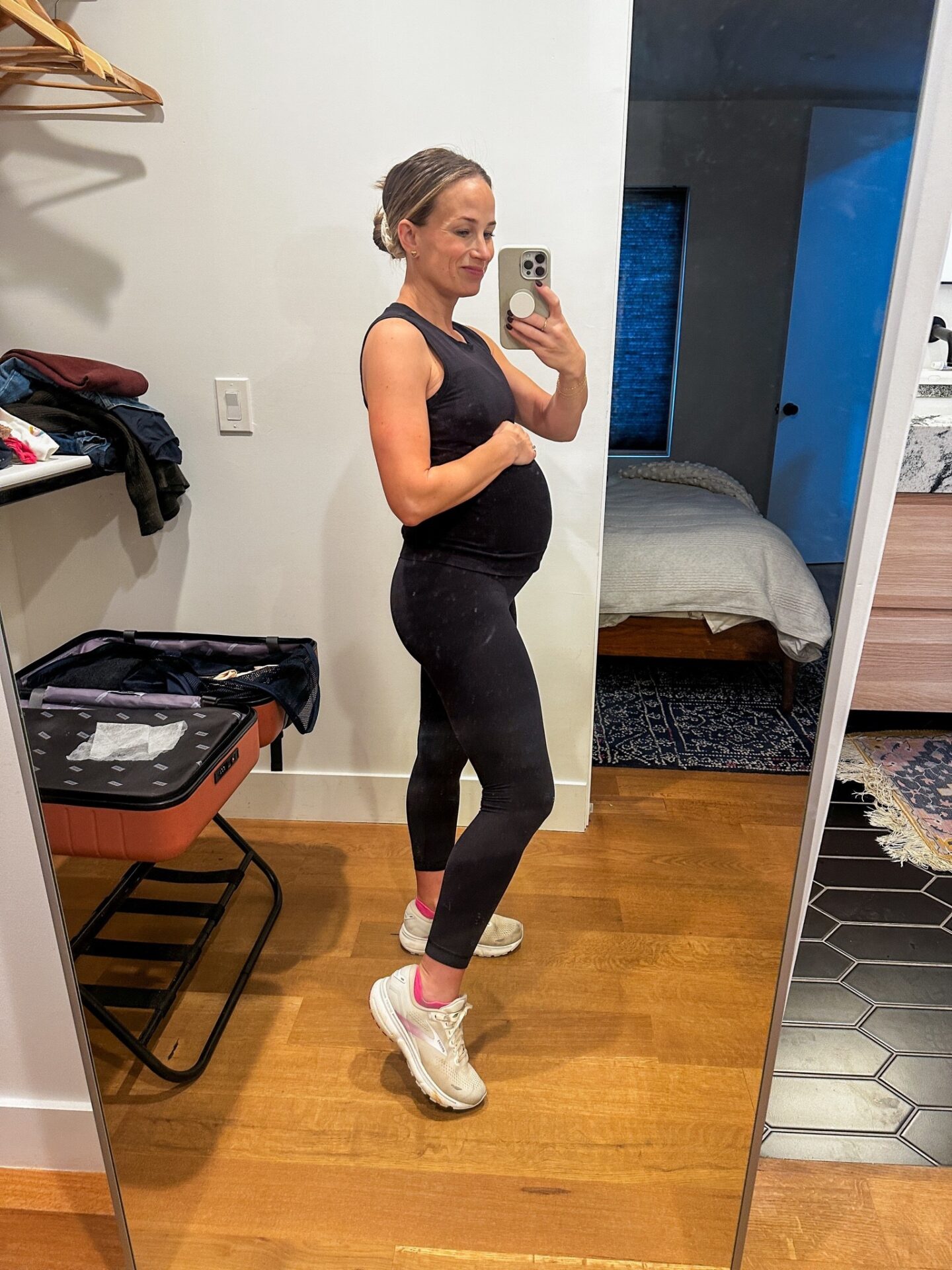TeriLyn Adams pregnant wearing Brooks running shoes