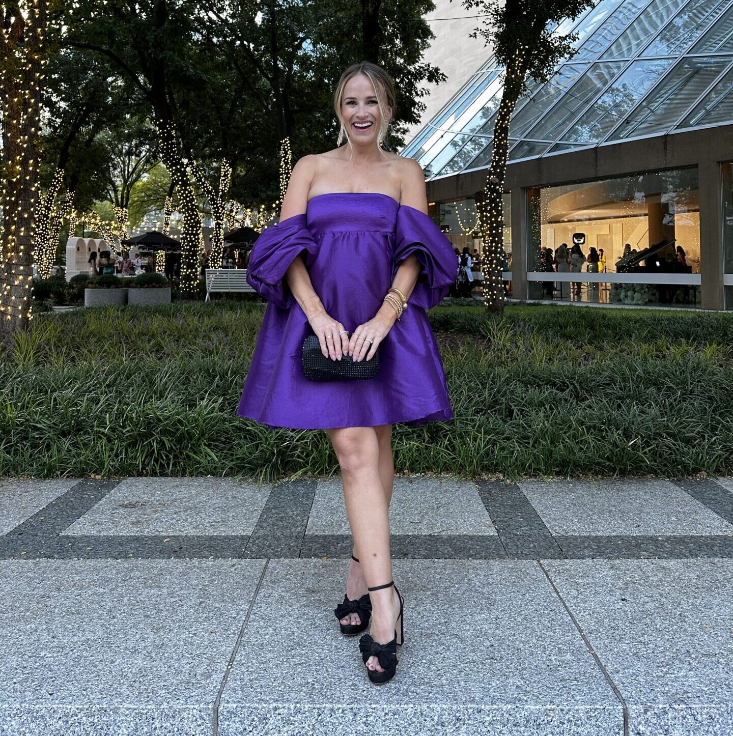 TeriLyn Adams in purple dress with Loeffler Randall bow heels