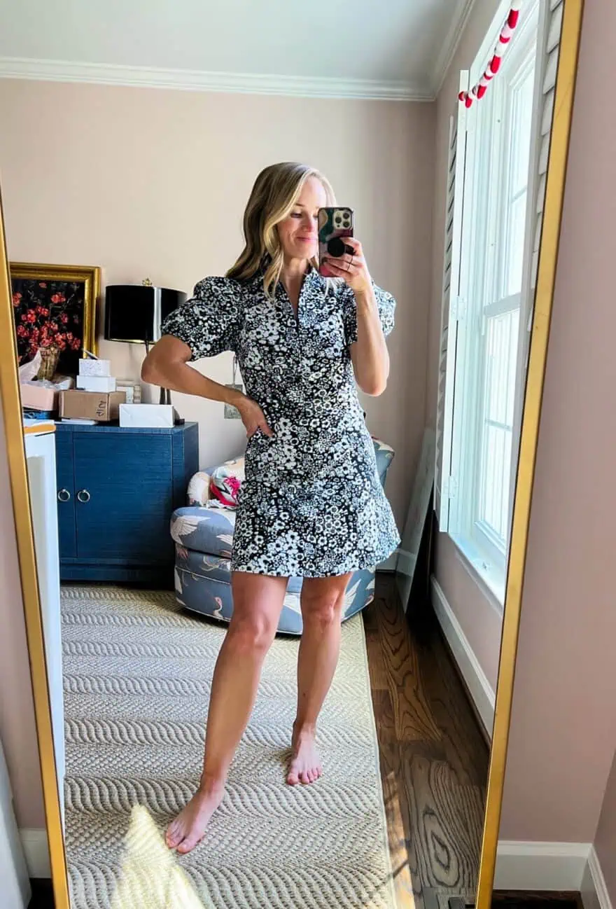 Woman taking selfie in Black Floral Front Zip Chrysanthemum Mini Dress