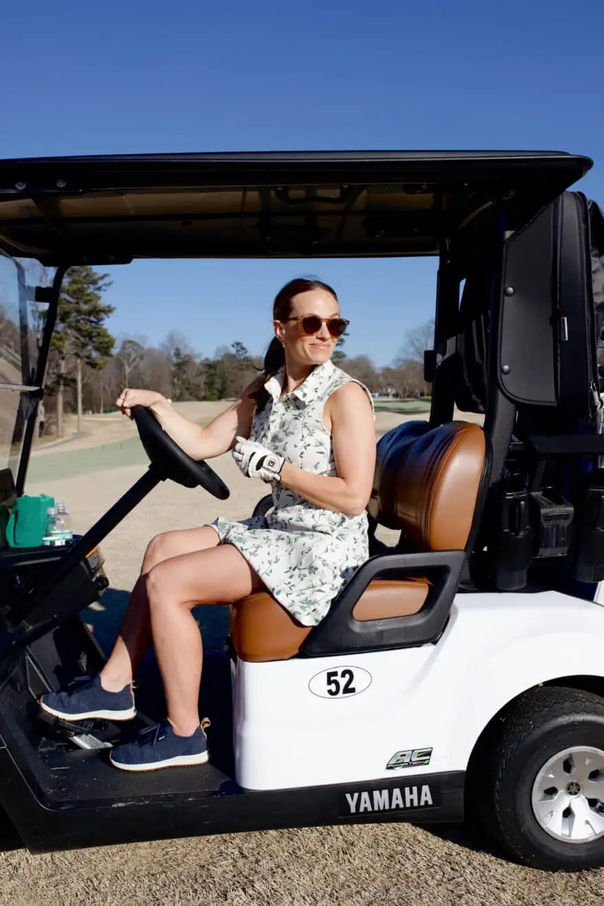 Woman driving golf cart what to wear when golfing women