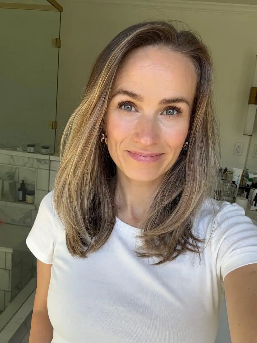 Woman's face after applying Crunchi Sunlight Tinted Moisturizer SPF 30