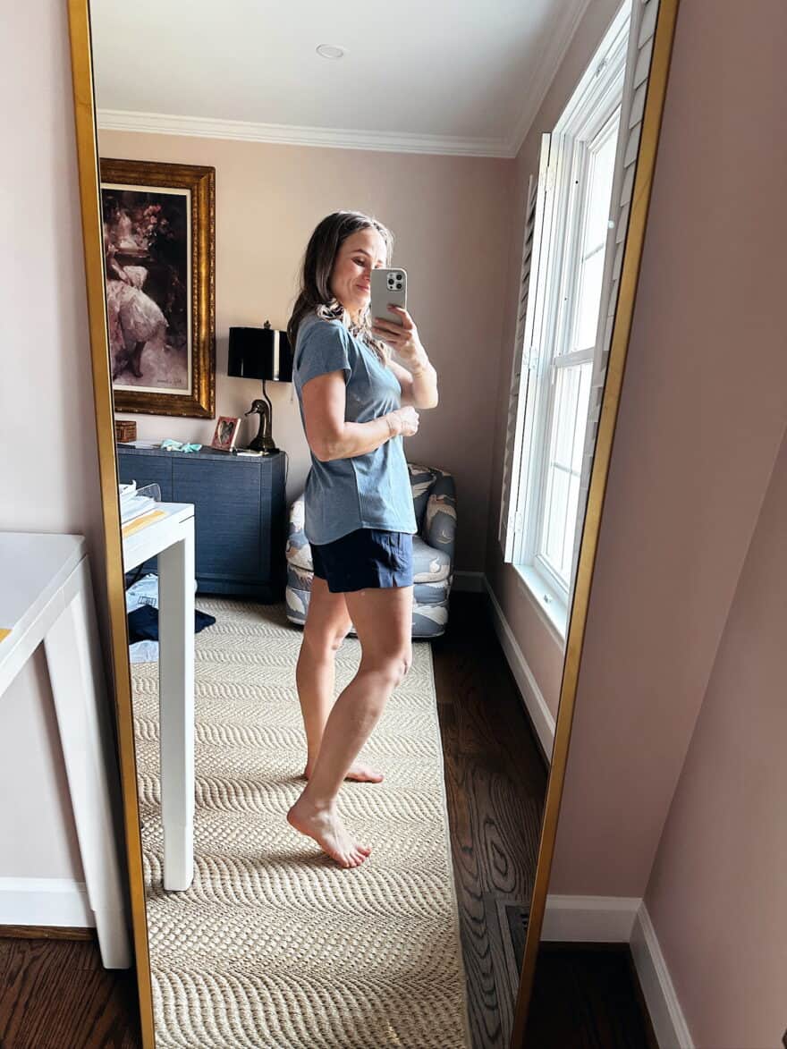 Woman wearing a Quince top