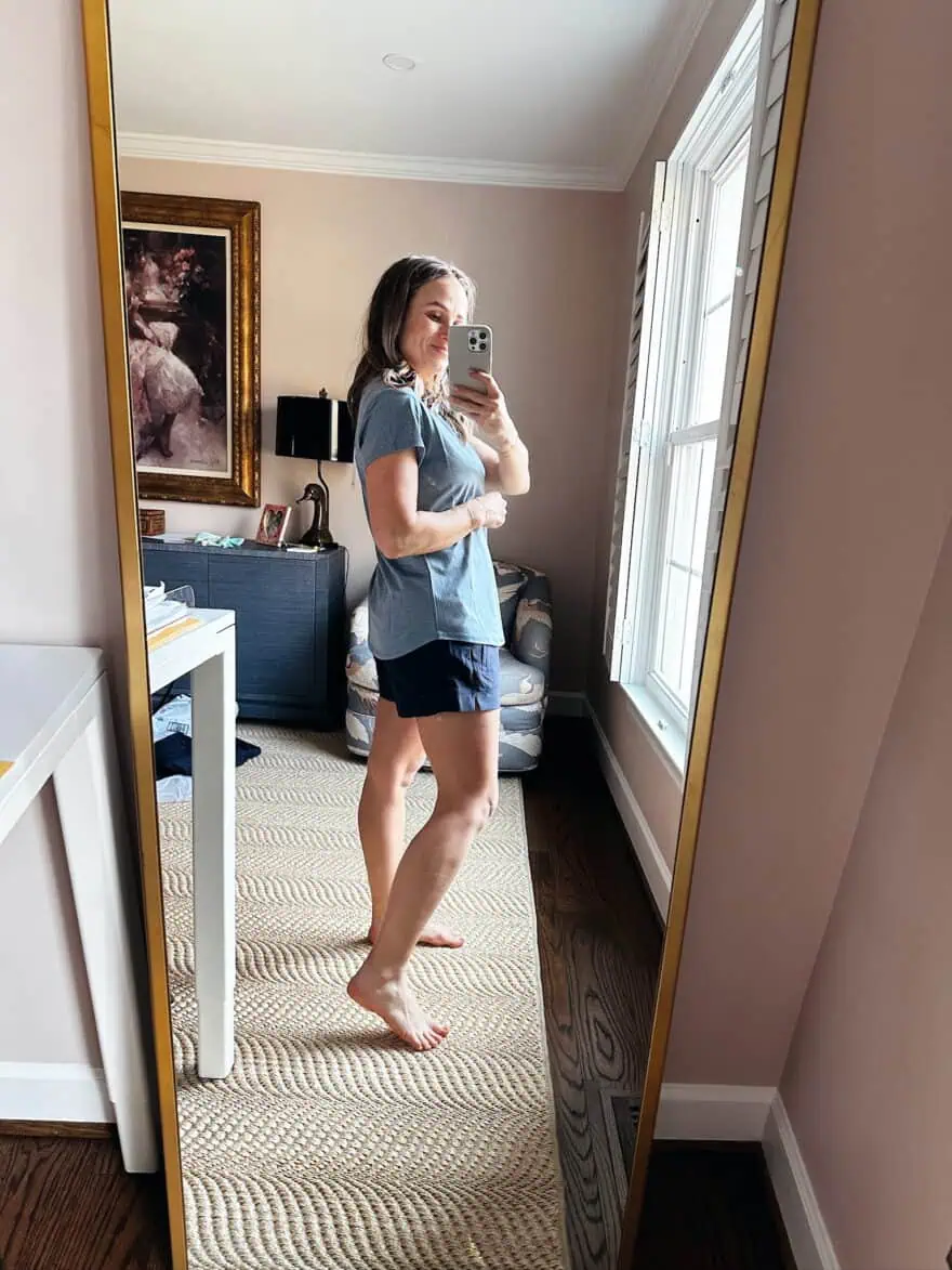 Woman wearing a Quince top