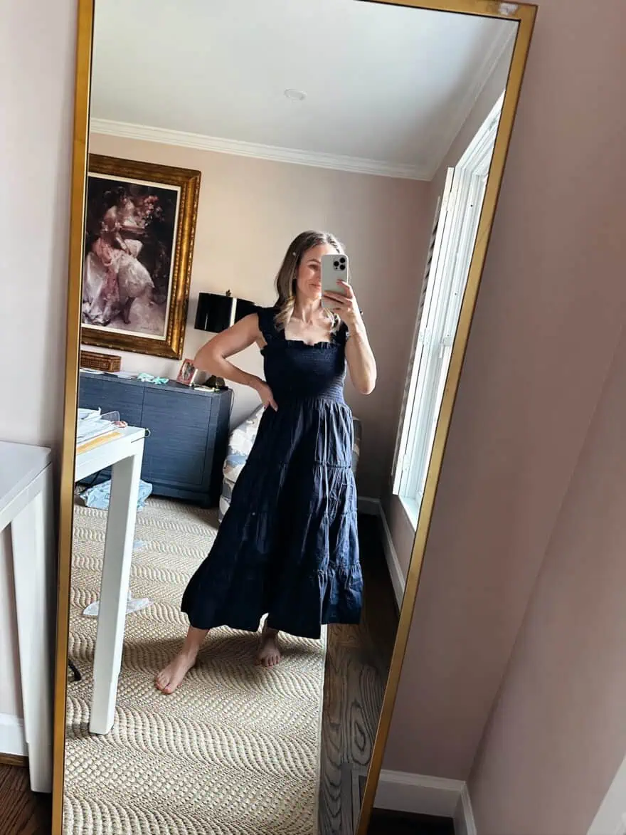Woman wearing Quince Organic Cotton Poplin Smocked Midi Dress