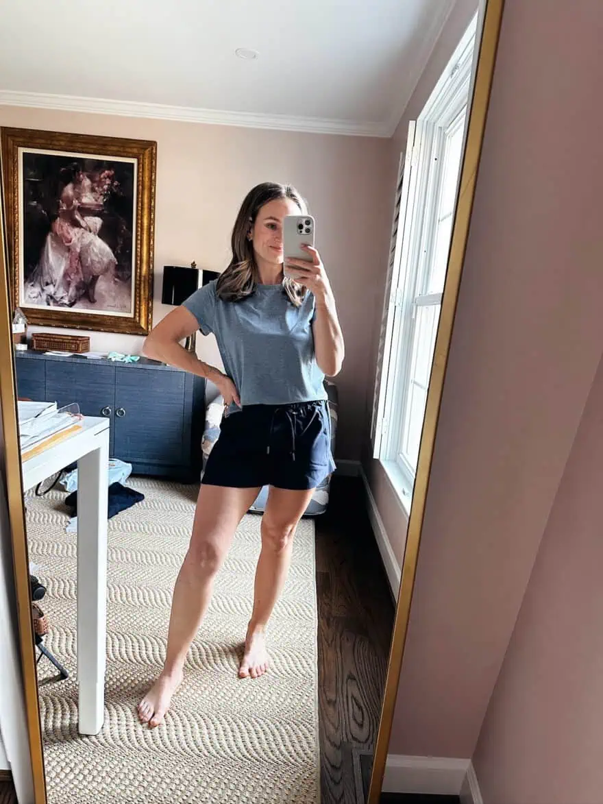 Woman wearing Quince shorts