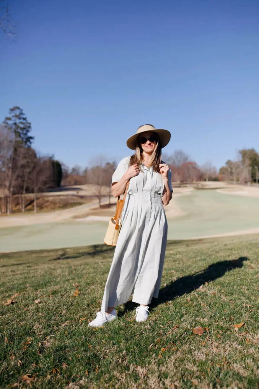 woman wearing dress with tennis shoes