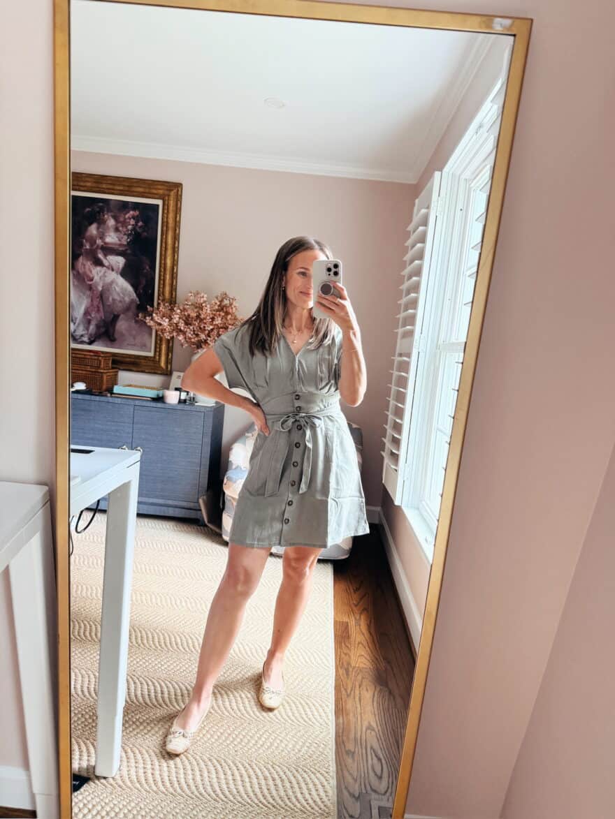 Woman wearing short sleeved dress with ballet flats