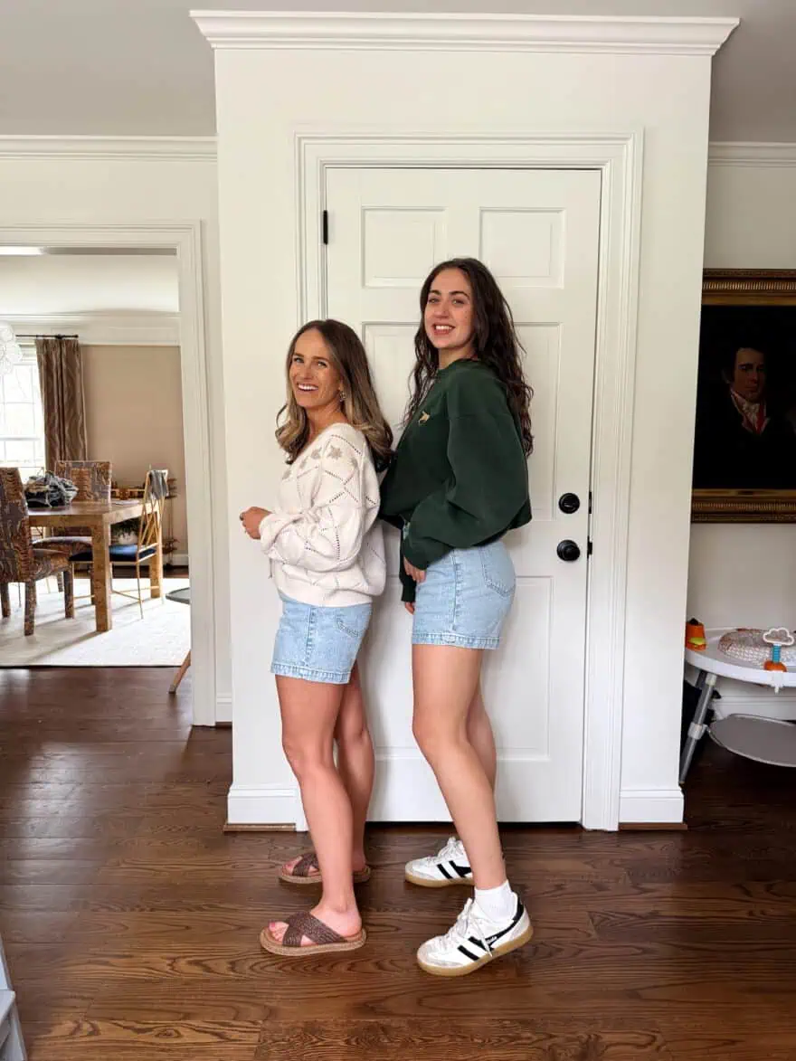 Two women of different heights wearing Abercrombie denim shorts