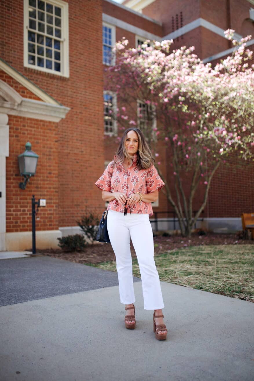 Woman wearing Scarlet Sonata Trapunto Stitch Sofia Shirt with white denim