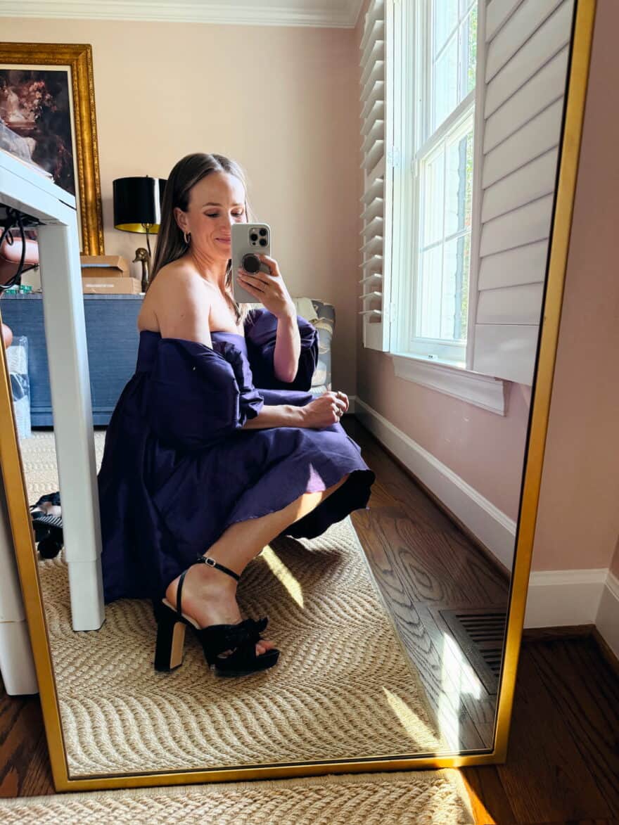 Woman wearing cocktail dress with Amazon dupe of Natalia Black Platform Bow Heels