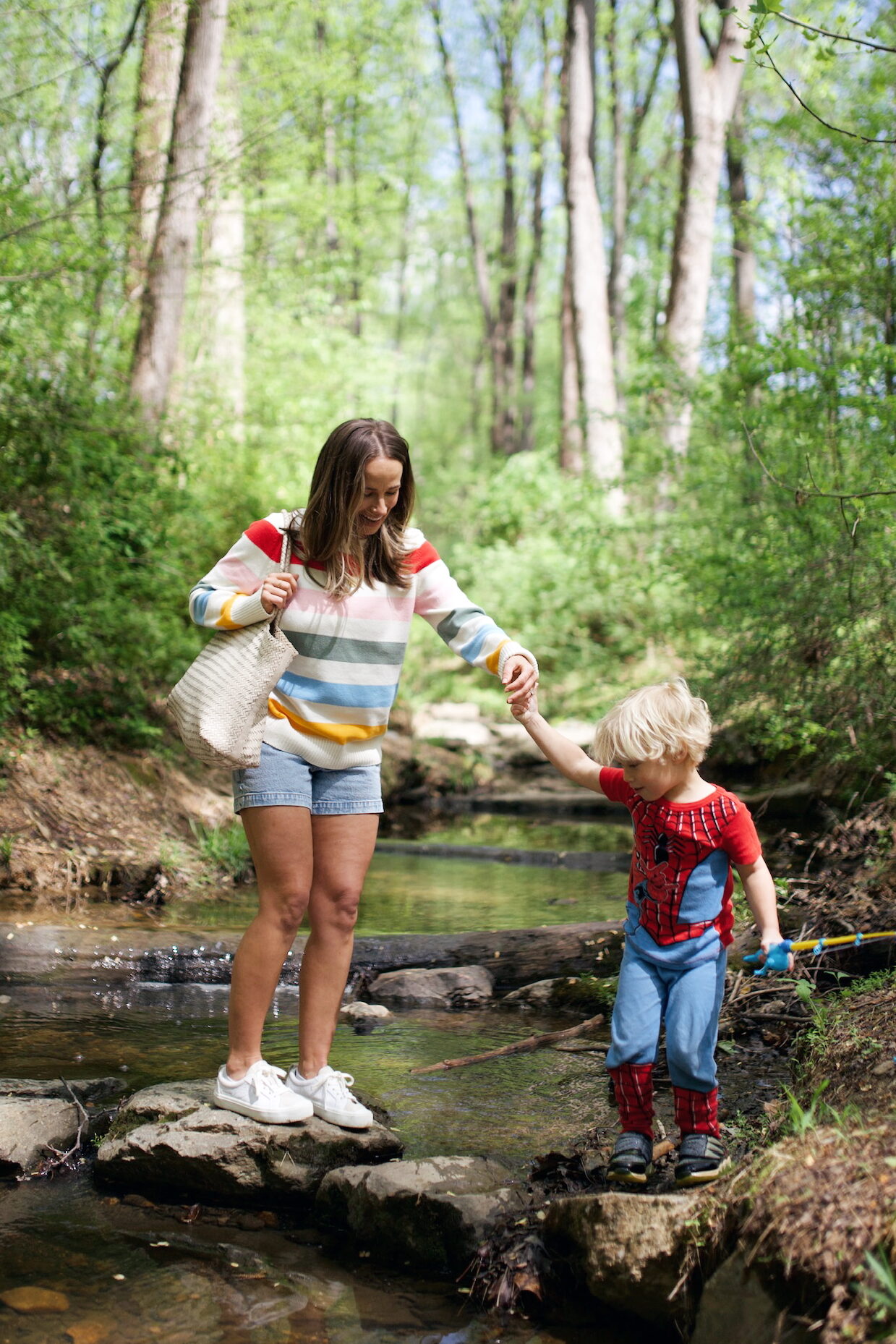 Woman with son on the river