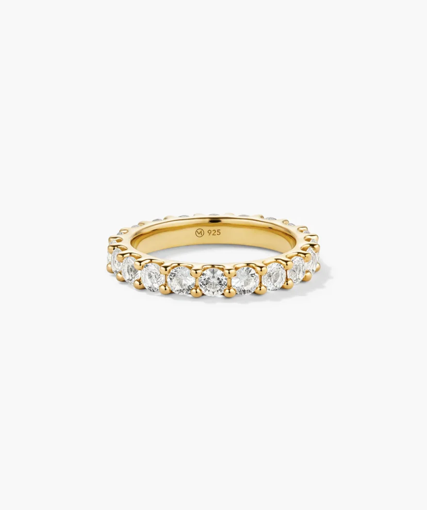 Mejuri Aurora Lab Grown Sapphire Eternity Ring with round white sapphires fully encircling gold band