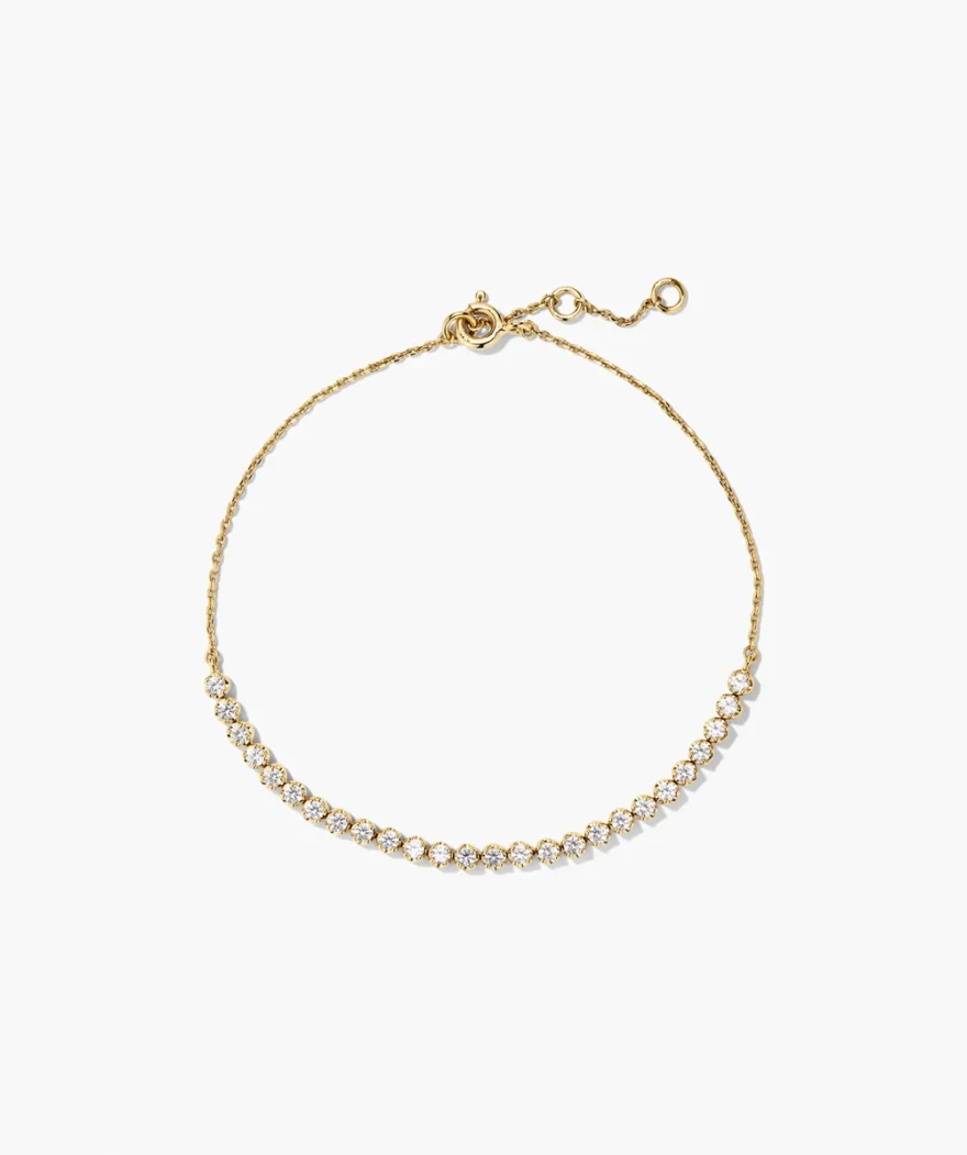 Mejuri Lab Grown Sapphire Half Tennis Bracelet with white sapphires set in gold on delicate chain